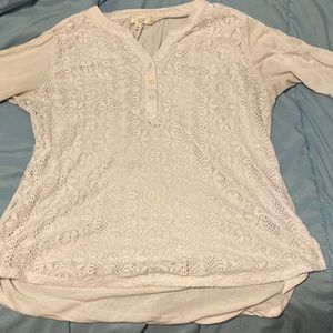 Women’s 1X Short sleeve shirt. It’s shorter in the front and longer in the back.